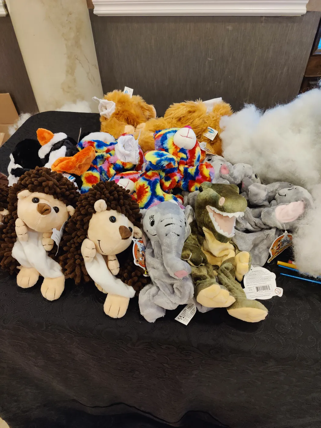 An assortment of plush animals on a table